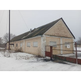 ½ частина будівлі млина (зерносховище), загальною площею 200,8 кв.м., за адресою: Полтавська обл., Хорольський р., с. Штомпелівка, вул. Центральна, буд. 35а