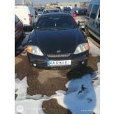 Транспортний засіб марки HYUNDAI, модель COUPE, ДНЗ КА8364ЕІ, номер кузова KMHHN61DP4U115613, чорного кольору , рік випуску 2003
