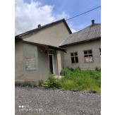 358/1000 частини нежитлової будівлі школи, загальною площею 459,1 кв. м., розташованої за адресою: Закарпатська область, Великоберезнянський район, село Волосянка, вулиця Без назви, 287 В