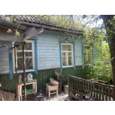 1/2 ч. житлового будинку та 1/2 ч. земельної ділянки, загальною площею 0,1333 га, кадастровий номер 3222484201:01:001:0003, що знаходяться за адресою: Київська обл., Фастівський р-н., с. Малютянка, вул. Героїв Танкістів, 38