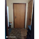 1/5 та 1/15 частини двокімнатної квартири загальною площею 50.3 кв.м., розташована за адресою: Полтавська область, м. Кременчук, вул. Велика Набережна, буд. 29, кв. 57