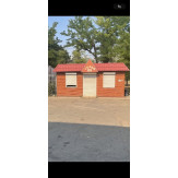 1/2 будівлі магазину "Теремок", площею 23.40 кв.м., Миколаївська обл., м. Снігурівка, вул. Незалежності (Суворова), 104-А, та 1/2 ЗД, площею 0.0024 га, КН 4825710100:36:044:0002, Миколаївська обл., м. Снігурівка, вул. Незалежності (Суворова), 104